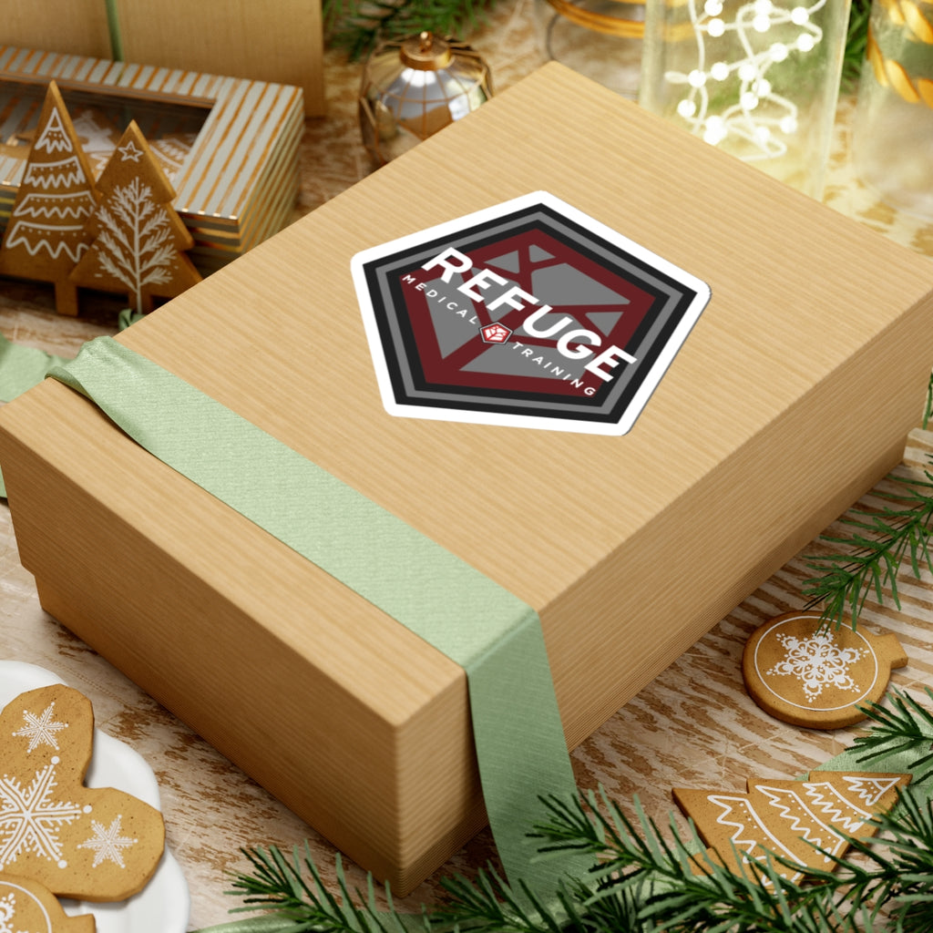Refuge Medical logo sticker 4" x 4" on a box