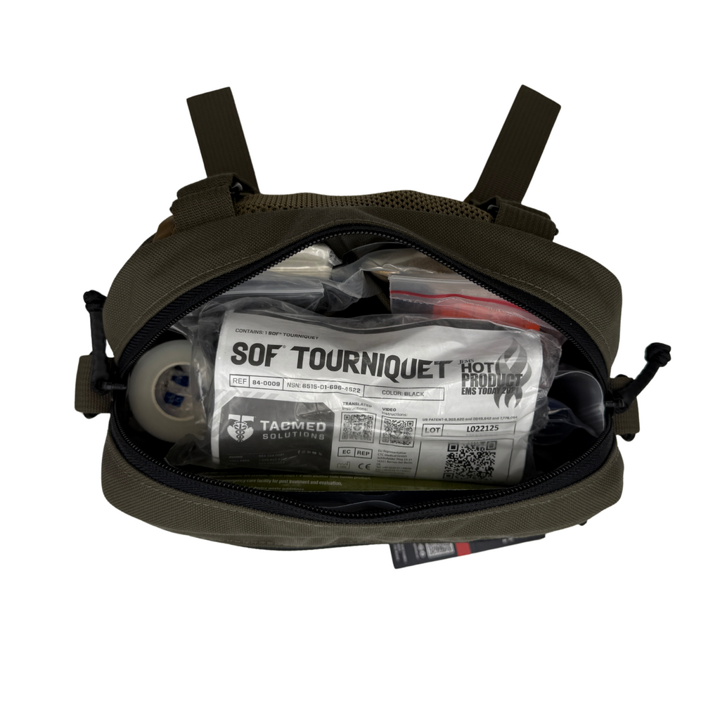 Tactical bag with SOF Tourniquet and other medical supplies on a white background
