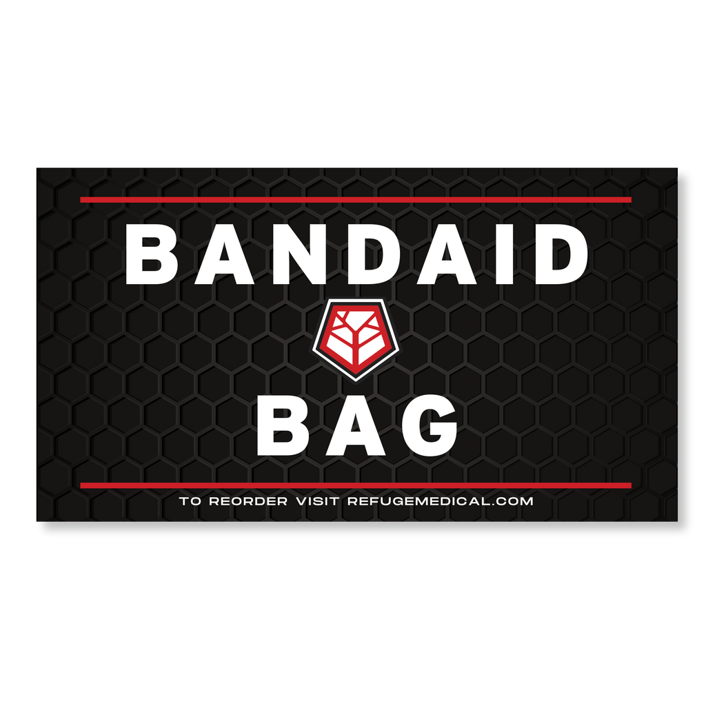 Refuge Medical Bandaid Bag label- black with white text and red accents