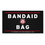Refuge Medical Bandaid Bag label- black with white text and red accents