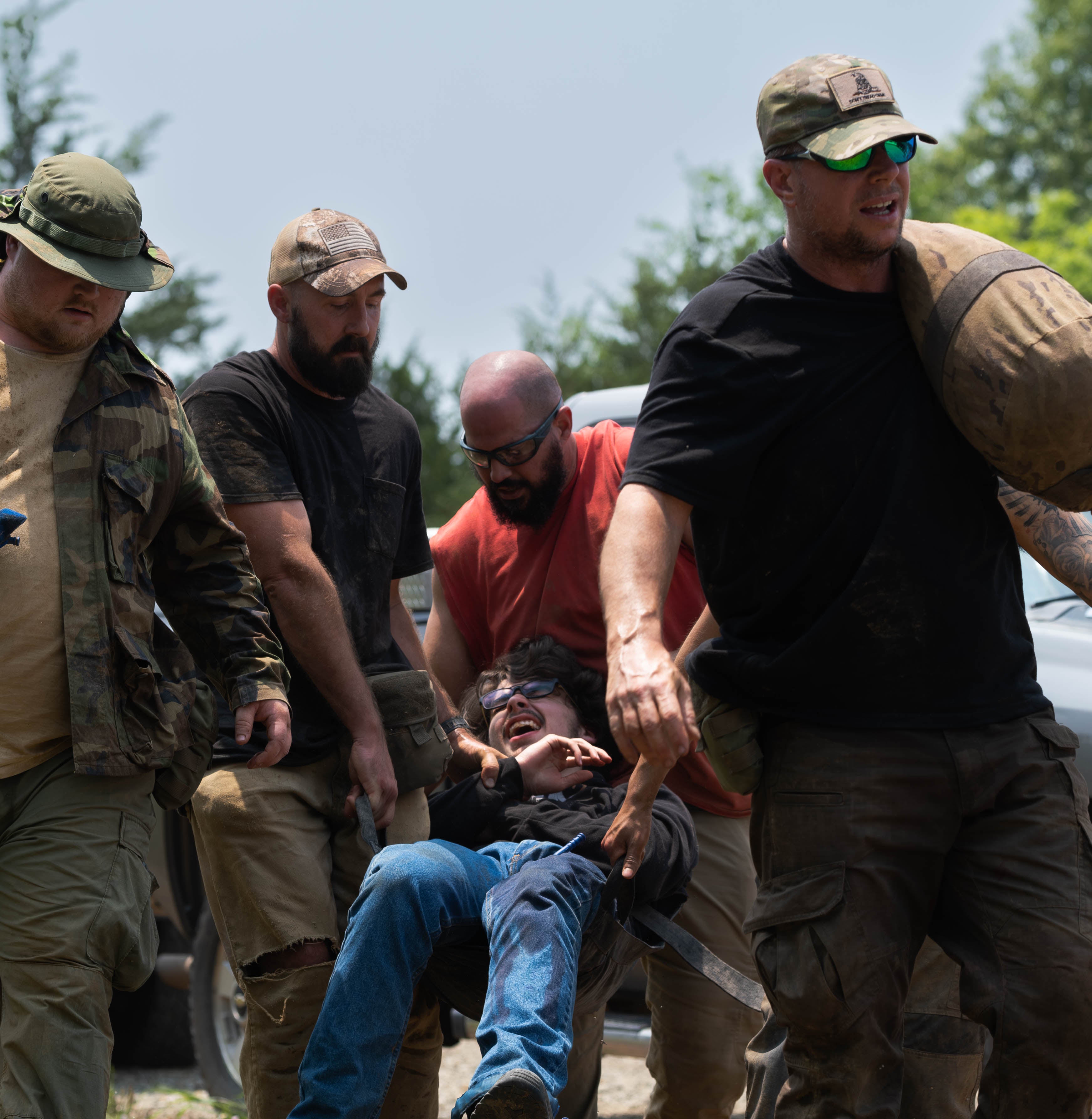 Students litter carrying a casualty during training scenario