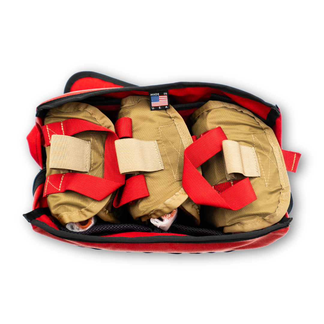 Refuge Medical Mass Cass First Aid Kit - Red, top view open showing three BearFAK inners